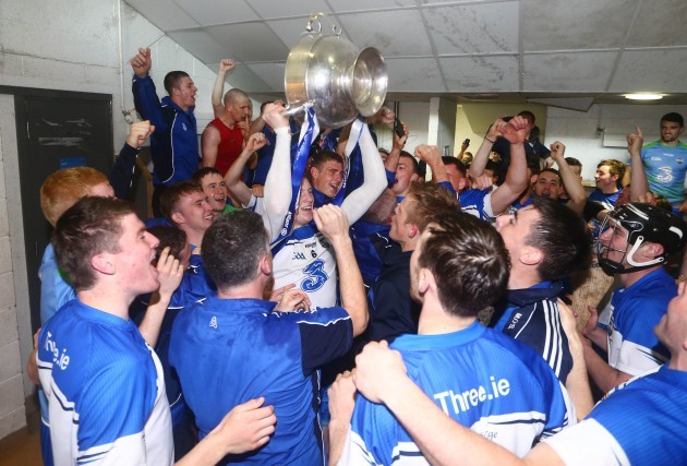 Waterford players celebrate with the cup