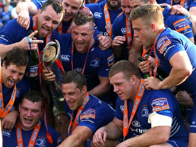 Jamie Heaslip with the trophy and teammates at the end of the match