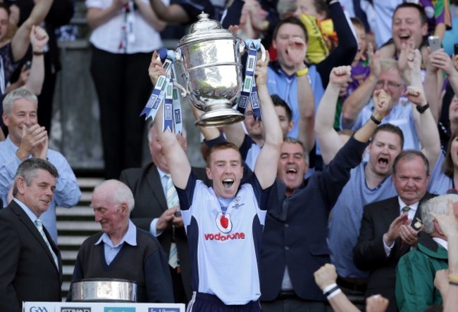 John McCaffrey raises the O'Keeffe cup