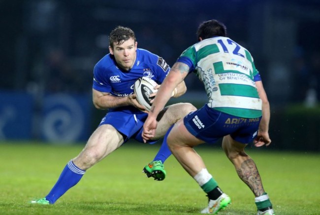 Gordon D'Arcy tackled by Enrico Bacchin