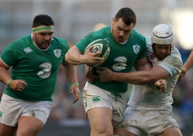 Cian Healy tackled by Dave Attwood