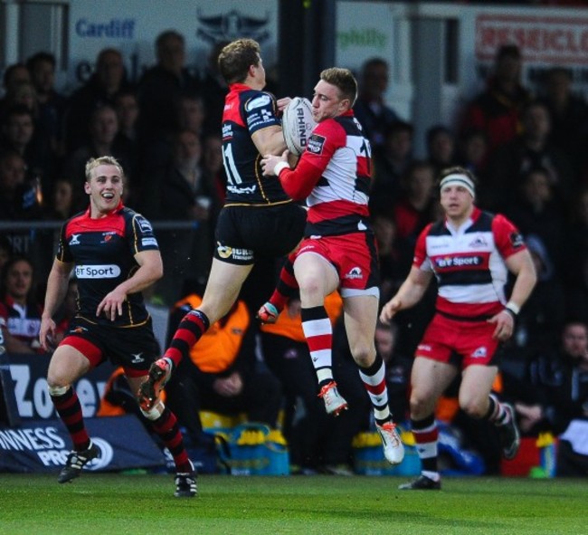 Hallam Amos and Dougie Fife compete for the high ball