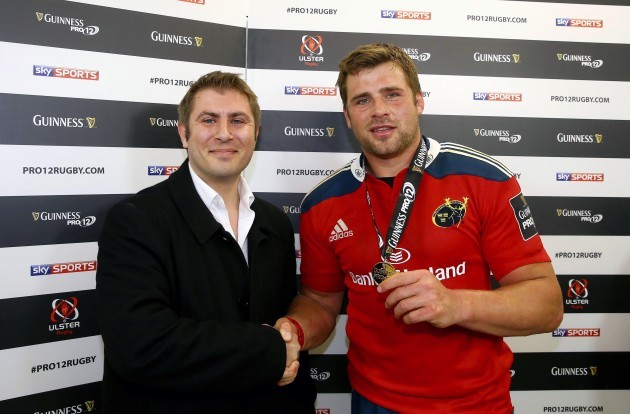 CJ Stander receives the Guinness Man of the Match award from Ross Broomfield