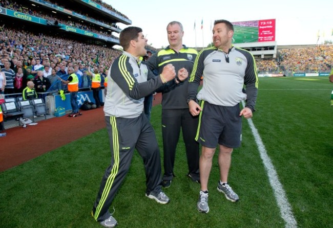 Eamonn Fitzmaurice celebrates with Diarmuid Murphy and Cian O'Neill