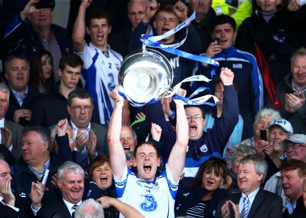 Kevin Moran lifts the cup