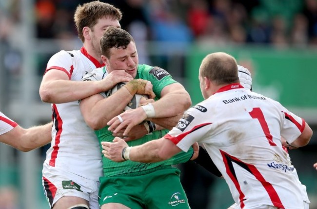 Iain Henderson and Callum Black tackle Robbie Henshaw