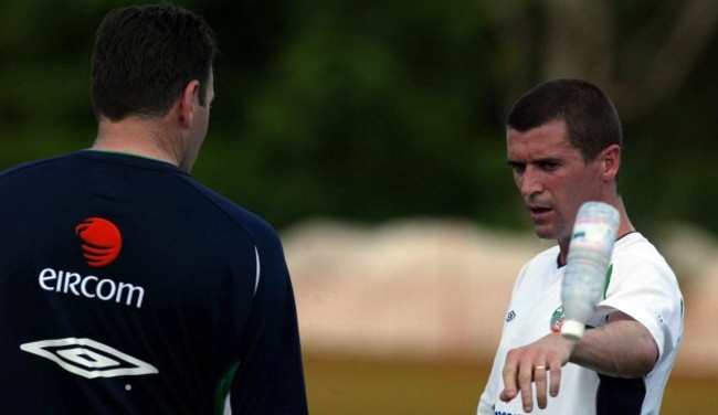 Roy Keane throws a bottle of water away