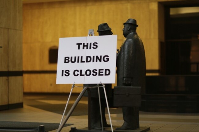 Discussion behind closed building sign