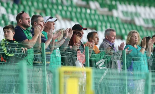 Ireland fans applaud their team after the game