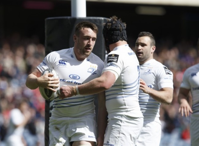 Jack Conan celebrates his try with teammates