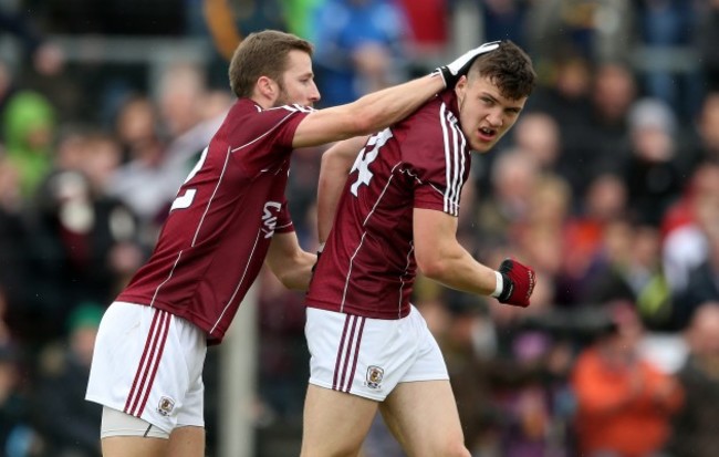 Damien Comer celebrates scoring his side's first goal with Michael Lundy