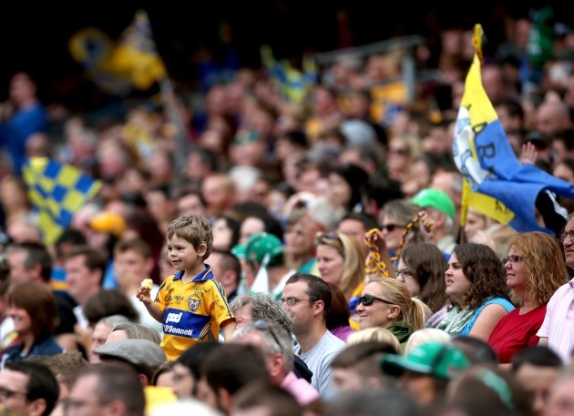 A young Clare fan looks on during the game