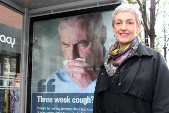 Dr Miriam McCarthy, Consultant at the Public Health Agency (PHA), at one of the PHA's 'coughing' bus shelters in Belfast. The innovative shelters are designed to grab the attention of passengers and raise awareness of lung cancer. The initiative is part of the PHA's 'Be Cancer Aware' campaign and there are five such shelters in Belfast and Derry/ Londonderry
