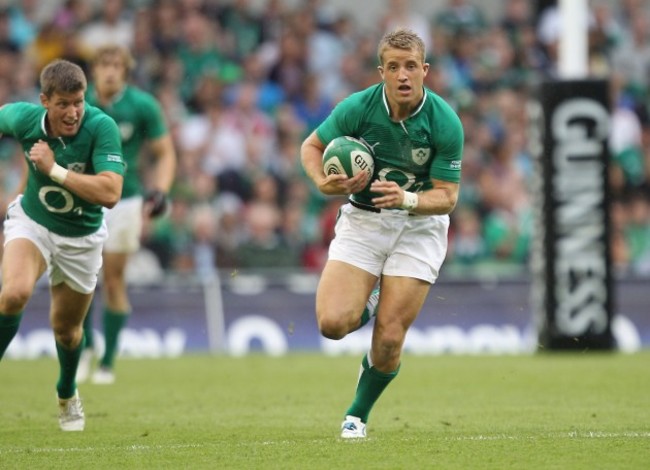 Luke Fitzgerald supported by Ronan O'Gara