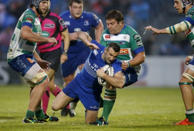 Dave Kearney tackled by Rupert Harden