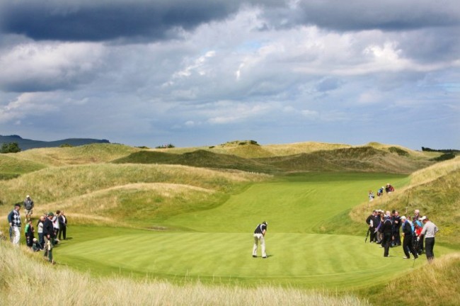 Eamonn Brady putts out on the 11th green