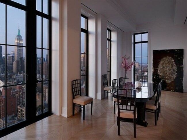 floor-to-ceiling-windows-cover-all-four-sides-of-the-penthouse-ensuring-plenty-of-natural-light-and-gorgeous-cityscapes