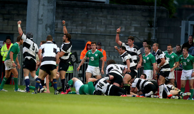 Barbarians celebrate as Alex Cuthbert scores a try
