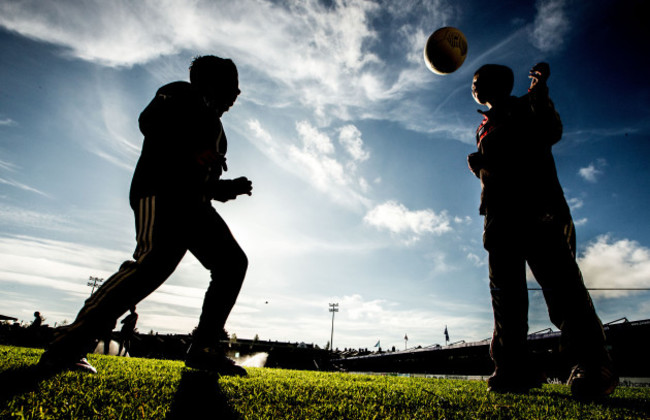 Two children play before the game