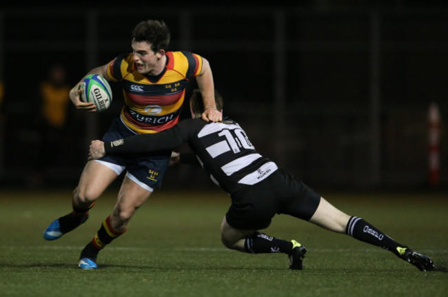 Tom Daly is tackled by Aidan Wynne