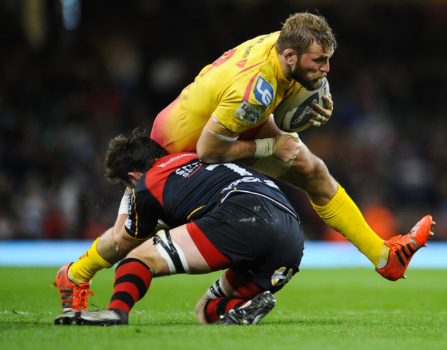 John Barclay is tackled by James Benjamin