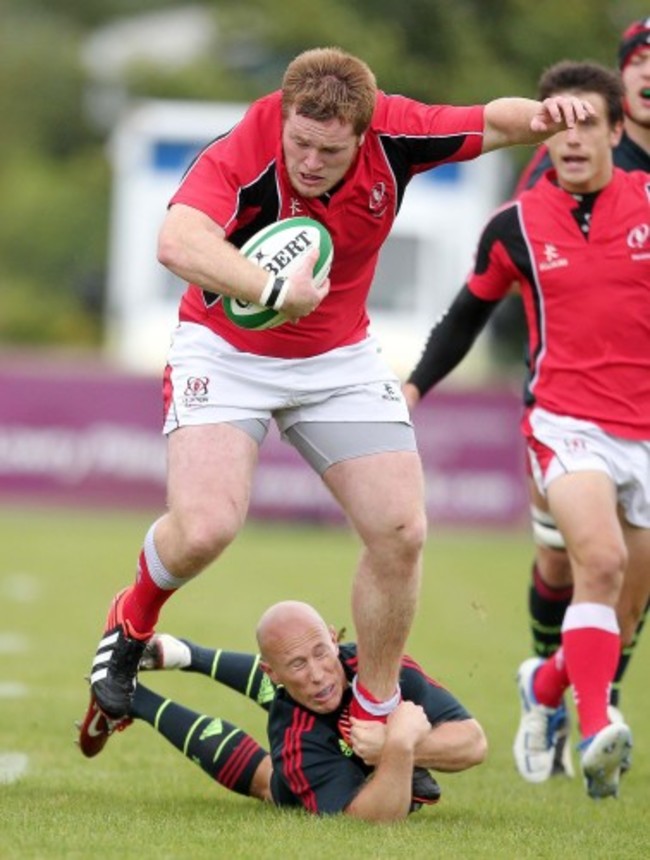 Conor Carey tackled by Peter Stringer 14/9/2012