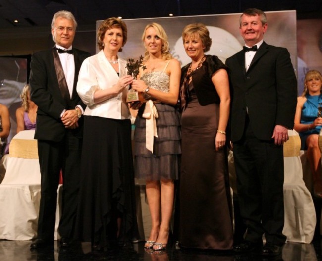 Nollaig Cleary receives her award from Tony Towell, President Mary McAleese, Geraldine Giles and Pol O'Gallchoir