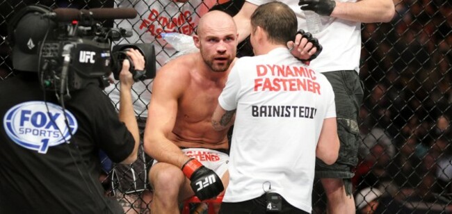 Cathal Pendred with John Kavanagh in between rounds