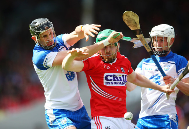 Maurice Shanahan and Brian OÕHalloran tackle Cormac Murphy