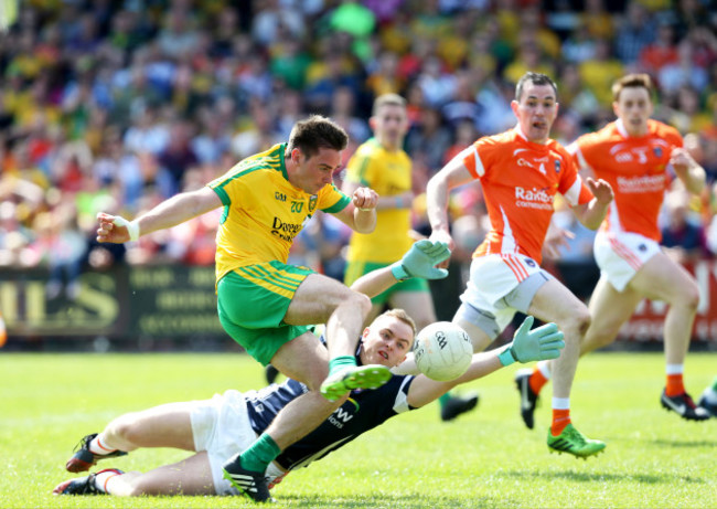 Martin O'Reilly scores their second goal past Mathew McNeice