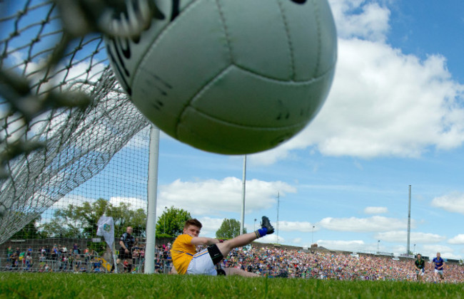 Robert Lambert is beaten from the penalty spot by Andrew Tormey