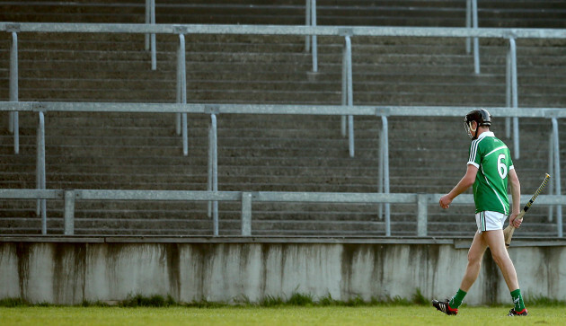 Diarmuid Byrnes leaves the field after being red carded