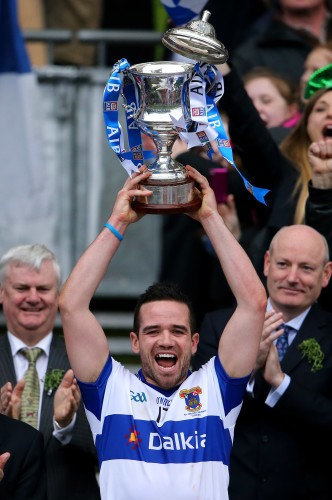 Ger Brennan lifts the cup