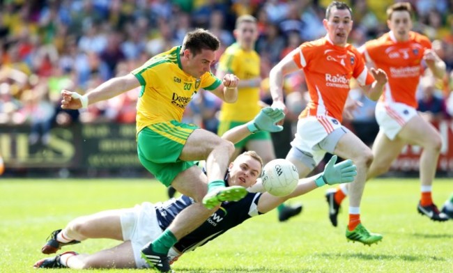 Martin O'Reilly scores their second goal past Mathew McNeice