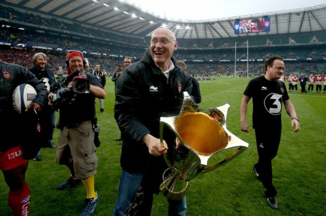 Bernard Laporte celebrates with the trophy