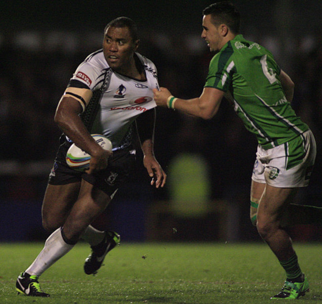 Petero Civoniceva gets tackled by Apirana Pewhairangi