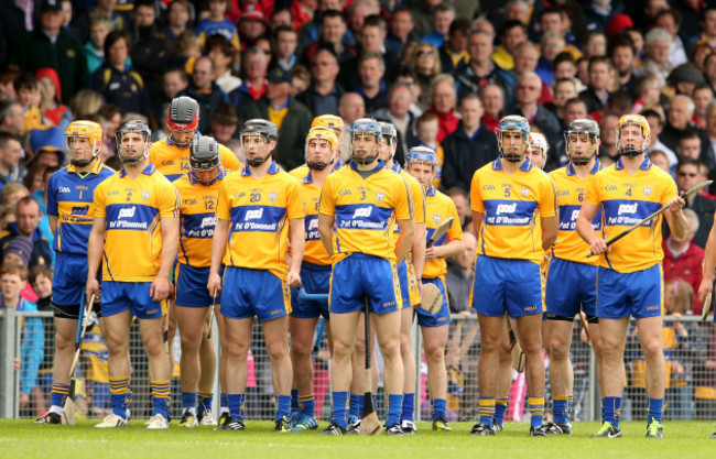 Clare players standing together for the national anthem