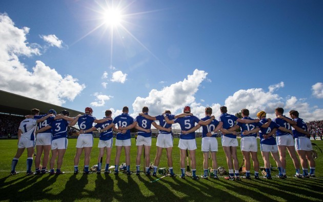 Laois players stand together for the national anthem