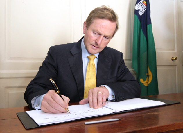 An Taoiseach, Enda Kenny TD signed the b