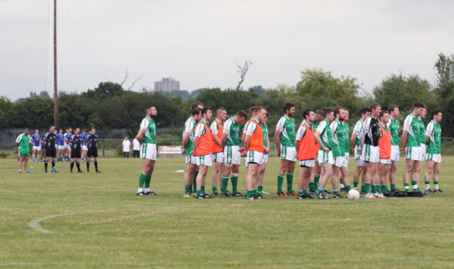 The two teams hold a minute's silence for the victims of the Berkeley tragedy before the game