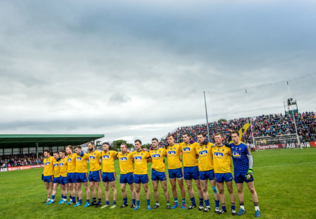 The Roscommon team stand for a minutes silence