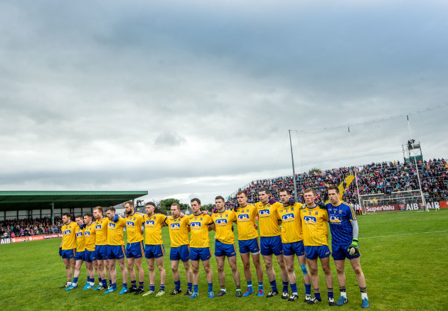 The Roscommon team stand for a minutes silence
