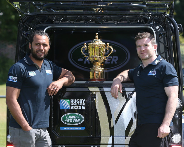 Gordon D'Arcy and Isa Nacewa pose with the Rugby World Cup 2015 Defender as it brings the Webb Ellis Cup to Old Belvedere RFC as part of the Rugby World Cup Trophy Tour_1