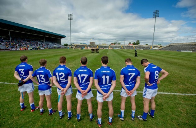 Laois and Antrim players stand for minutes silence for the victims of the Berkley tragedy