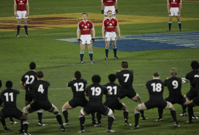 Brian O'Driscoll and Dwayen Peel watch as the Haka is preformed