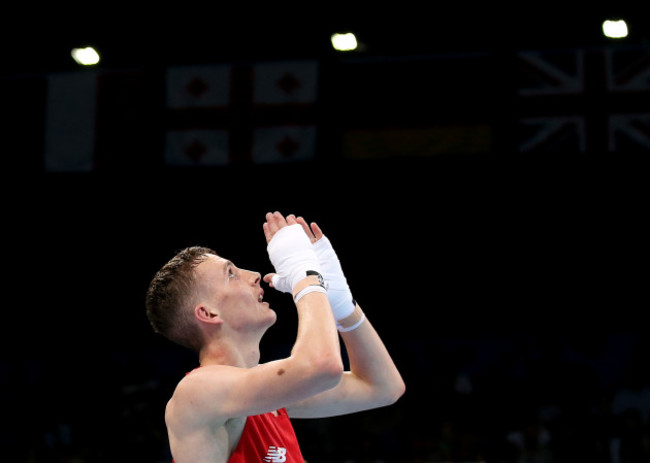 Brendan Irvine celebrates after winning his bout against Dmytro Zamotayev