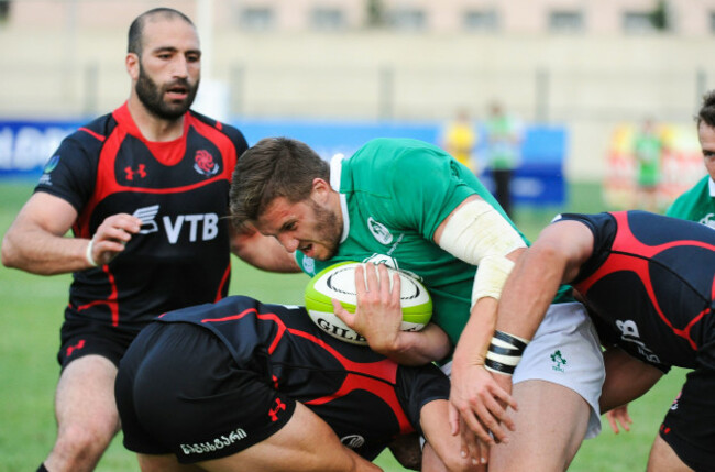 Stuart McCloskey is tackled