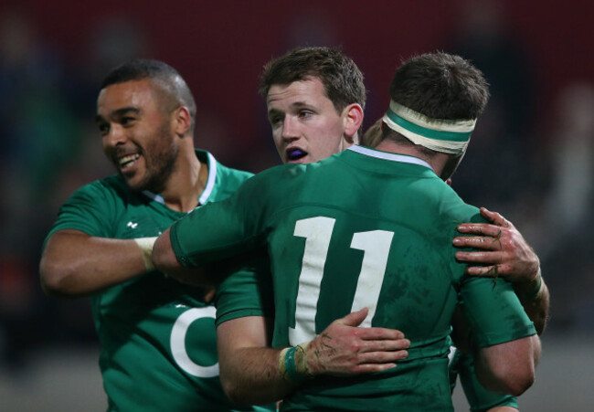Craig Gilroy congratulated by Simon Zebo and Fergus McFadden