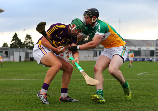 Cillian Kiely tackles Conor McDonald