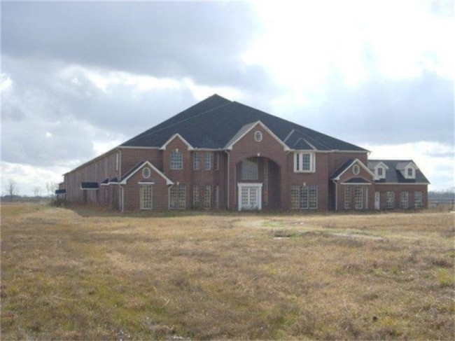 no-driveway-landscaping-or-sidewalk-adorns-the-outside-of-this-gigantic-piece-of-real-estate